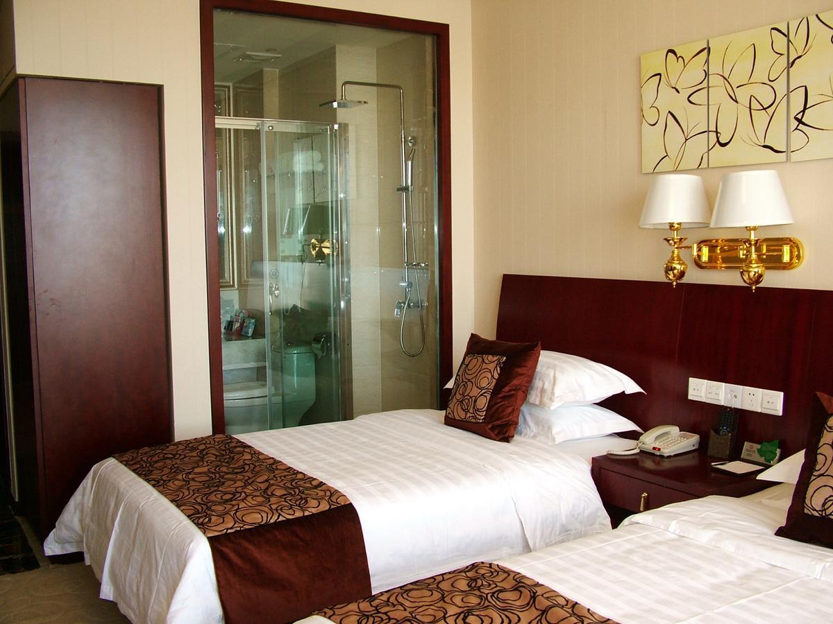 Fuxing Oriental Boutique Hotel Chifeng Kamer foto