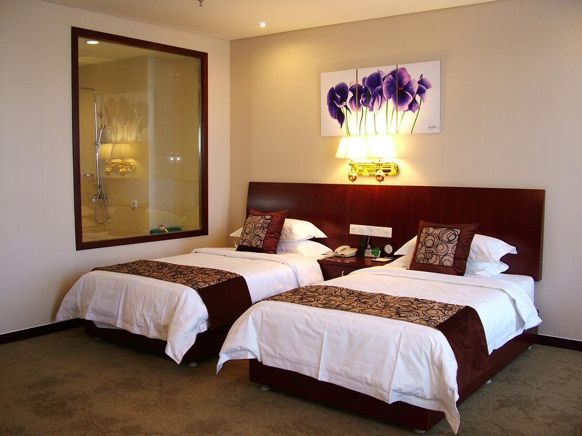 Fuxing Oriental Boutique Hotel Chifeng Kamer foto