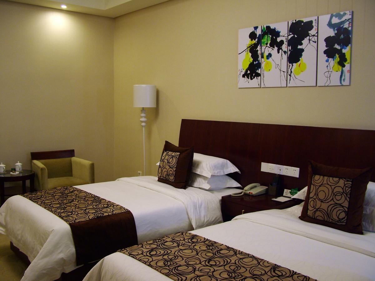 Fuxing Oriental Boutique Hotel Chifeng Kamer foto