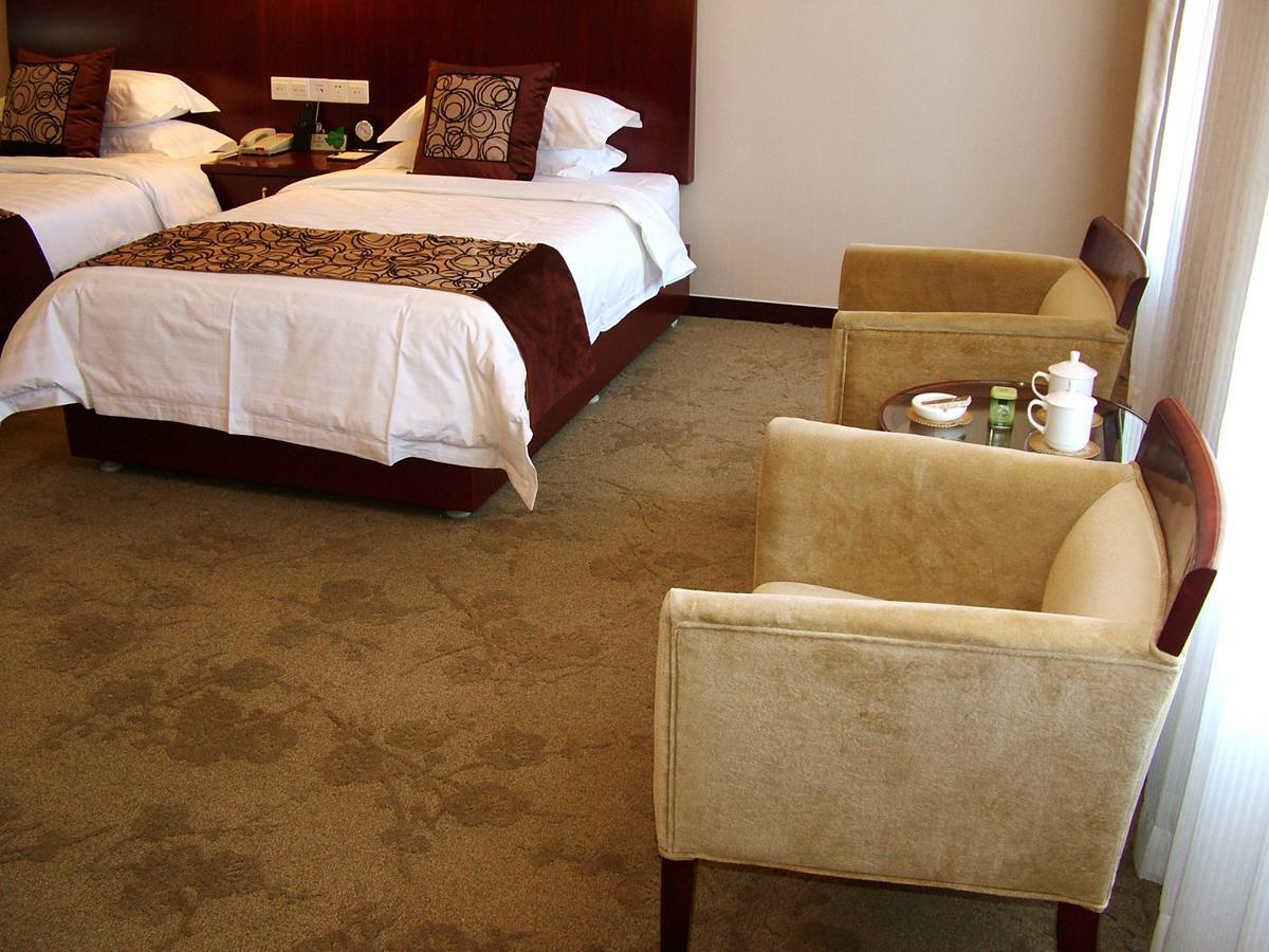 Fuxing Oriental Boutique Hotel Chifeng Kamer foto